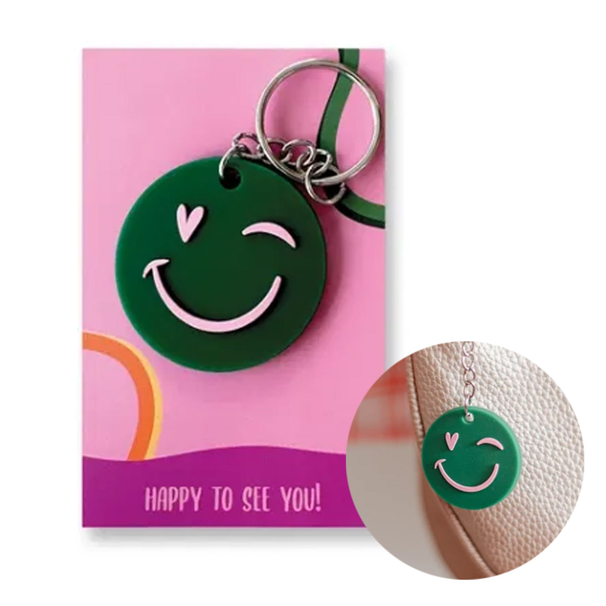 sleutelhanger met daaraan een smiley met als oog een hartje. Klein cadeautje voor vriendin