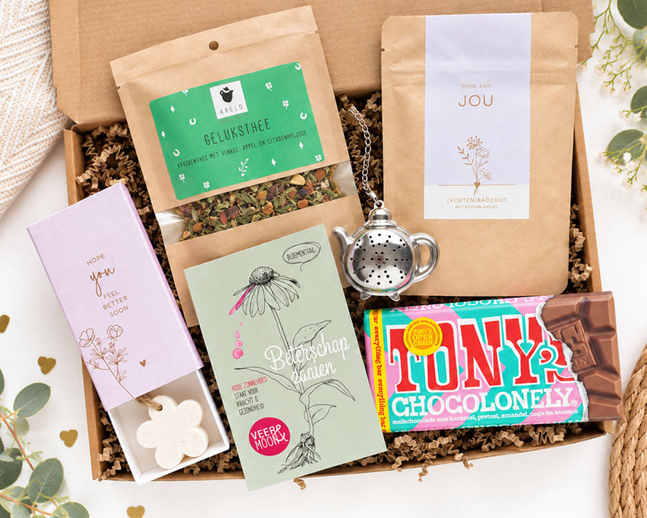 Beterschap cadeau met geluksthee bloemzaden en Tony’s Chocolonely