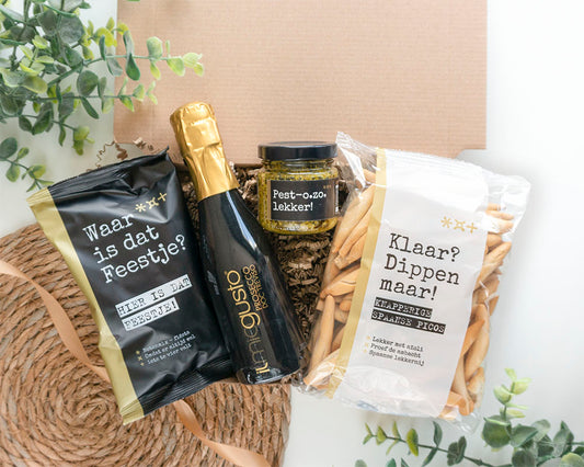 Cadeaupakket Een Feestje Om Uit Te Pakken met prosecco, notenmix, pesto en dipstengels