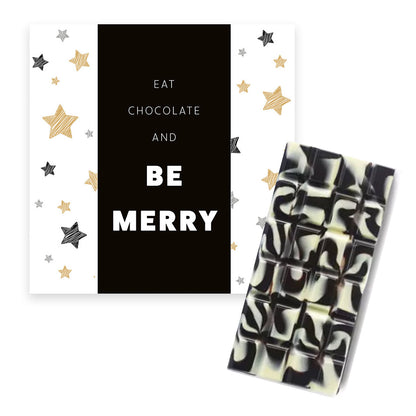 chocolade in doosje voor kerst met de tekst eat chocolate and be merry