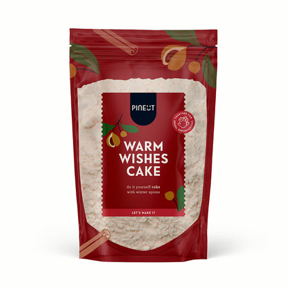 Pineut Warm Wishes Cake bakmix in rode verpakking met winterse kruiden
