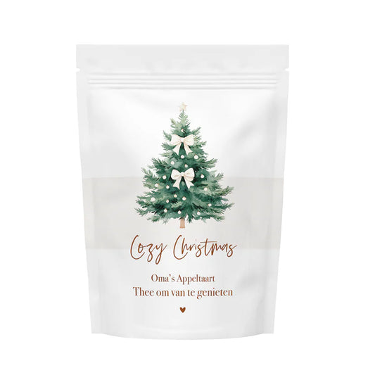 Zakje thee met de tekst “Cozy Christmas”, gevuld met 50 gram winterse thee met appeltaartgeur, als sfeervol kerstcadeau.