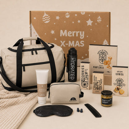 Kerstpakket Travel & Treats met reistas, waterfles, toilettas en snacks